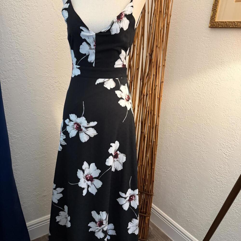 Black and white floral backless maxi dress with adjustable straps
